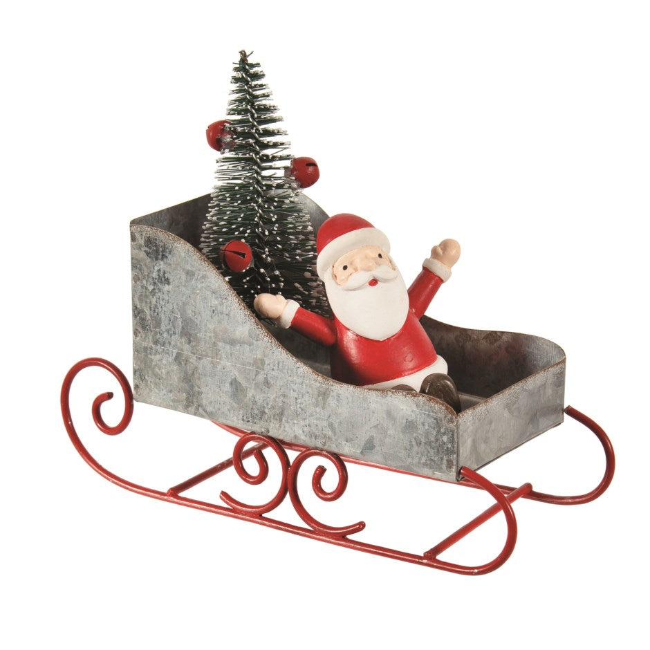 metal sleigh with Santa